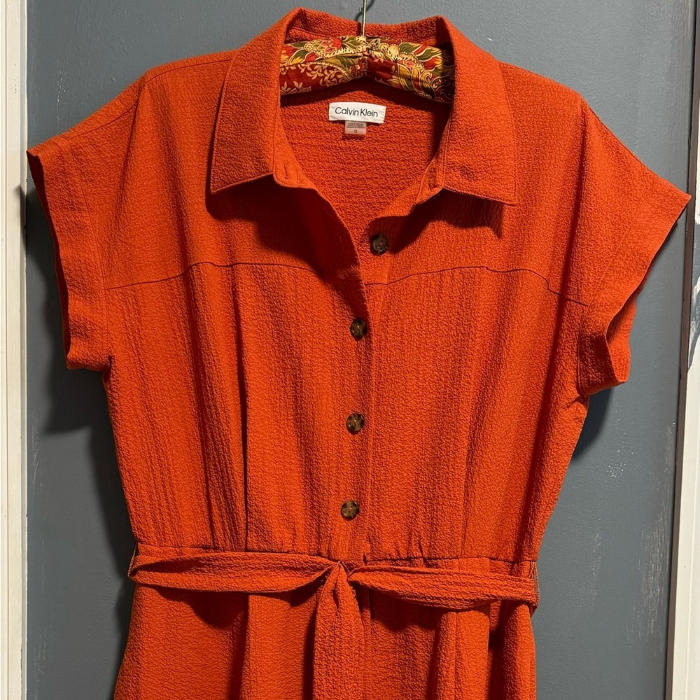 Orange dress. Calvin Klein. Size 12. Polyester.